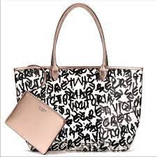 VICTORIA'S SECRET CLEAR GRAPHIC WITH GOLD TOTE BAG